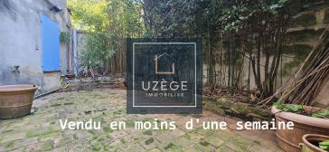 Maison de village avec cour et garage
