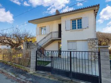 Maison divise en deux appartements avec jardin
