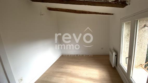 Paulhan:Immeuble de rapport de 3 appartements et une cave au centre du bourg
