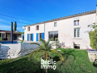 Maison 5 chambres avec piscine et garage
