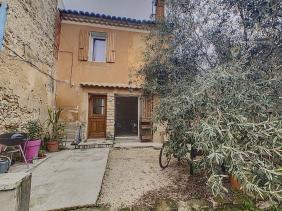 Maison avec jardin au coeur de la ville.
