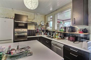 Maison individuelle, 4 chambres sur terrain de 725m�, garage
